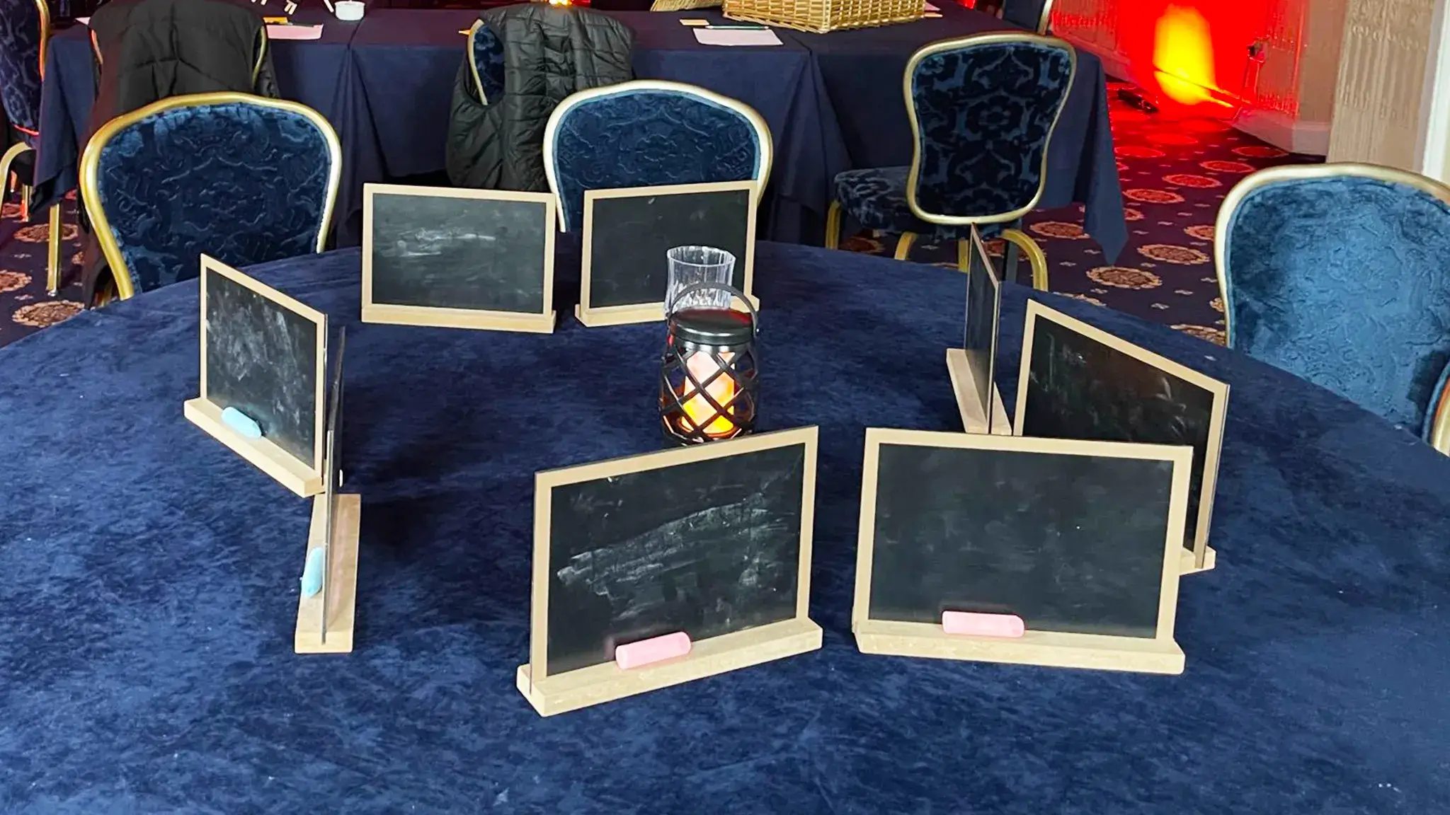 Betrayers team building tablets on table for riddles