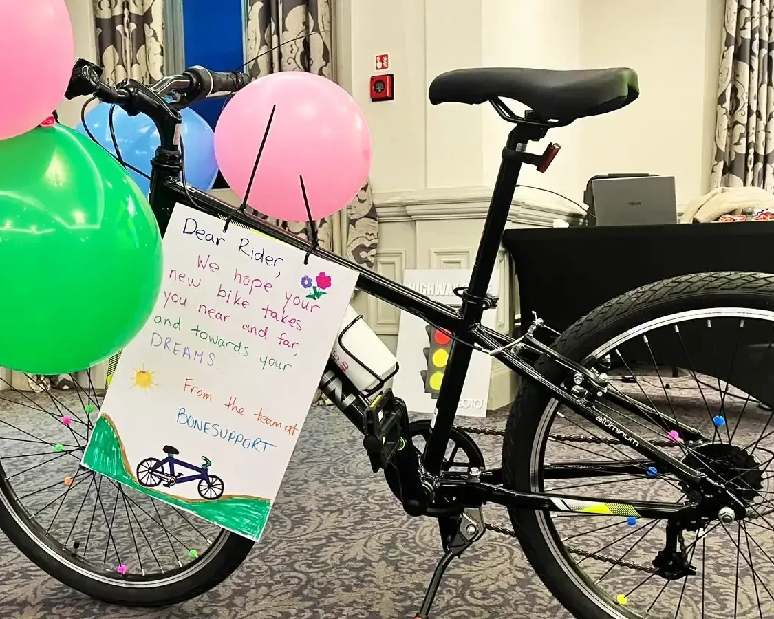 Assembled bike with personalized message after charity bike build team building