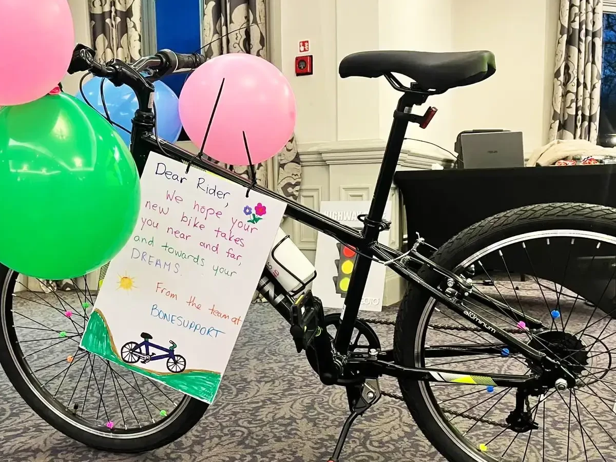 Assembled bike with personalized message after charity bike build team building