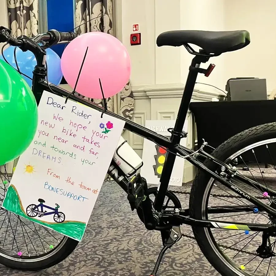 Assembled bike with personalized message after charity bike build team building