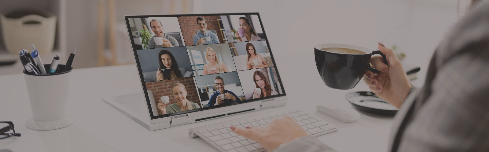 Employee sat at their tablet during a call on a virtual event