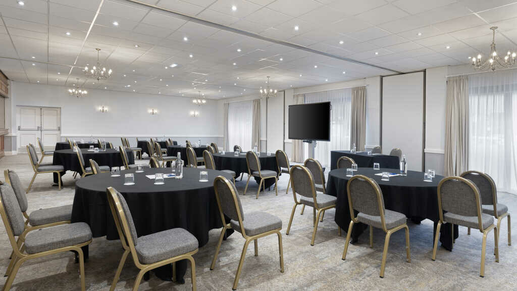 Multi round tables set up for a conference at the Delta Hotels Marriott Preston