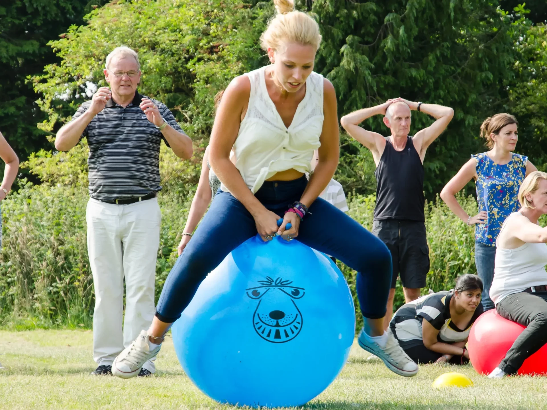 women hopping on space hopper Olympic sports day space horsy hoppers