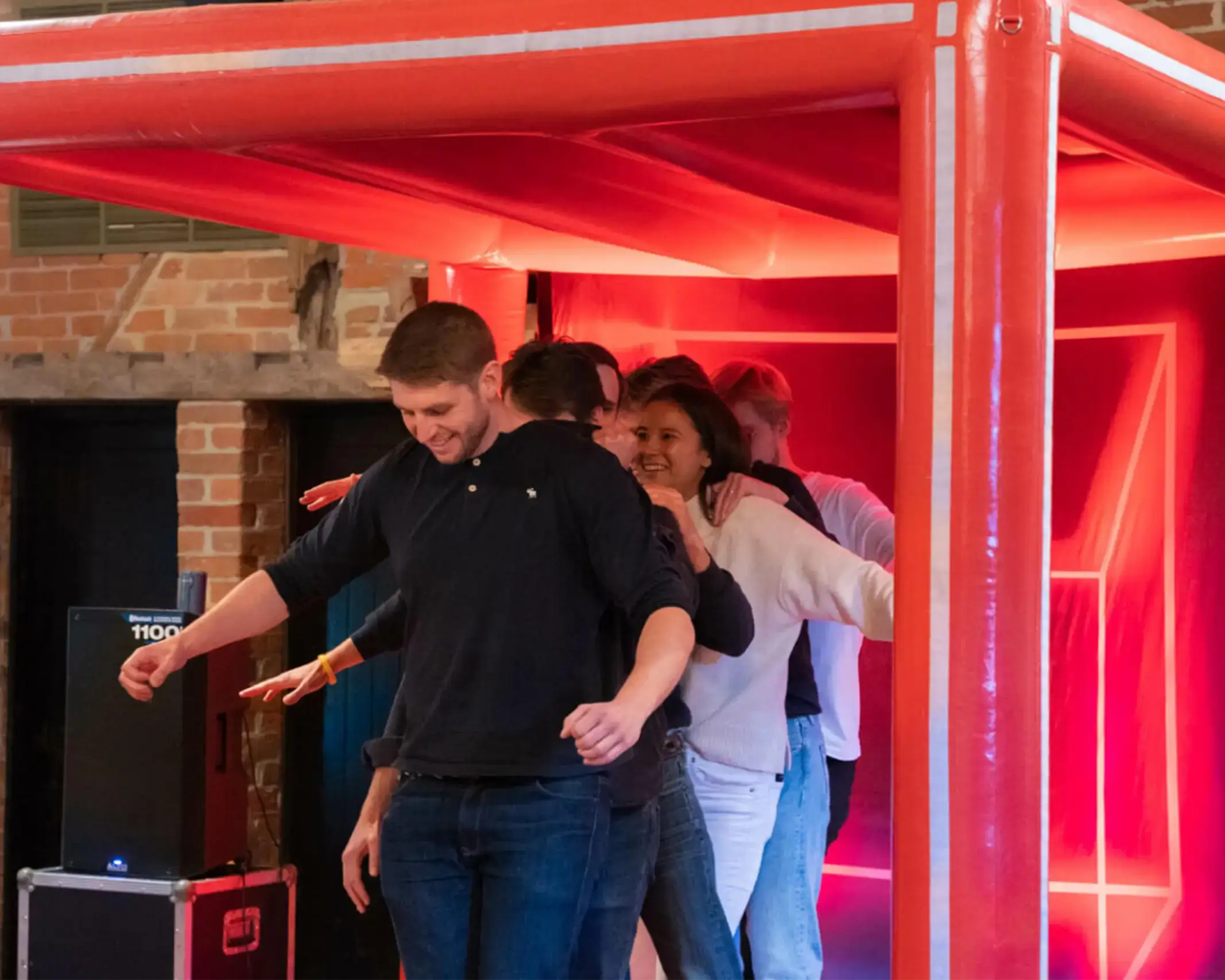 Under Pressure indoor team building activity inside red cube