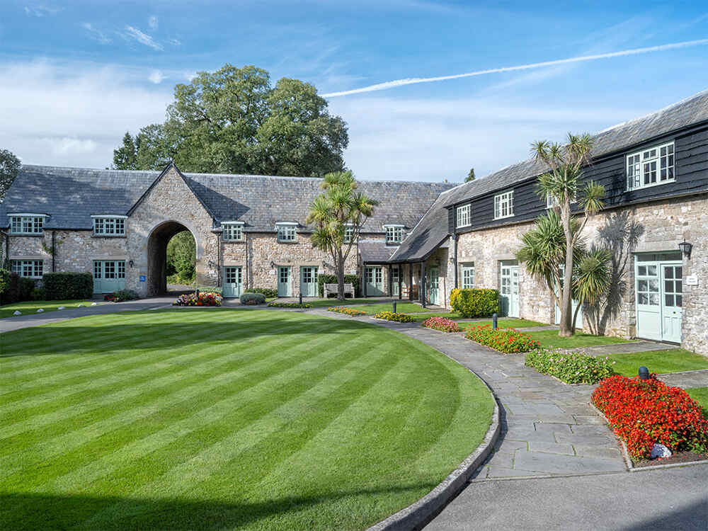 Courtyard photo of the stunning country house St. Pierre Country Club in Wales