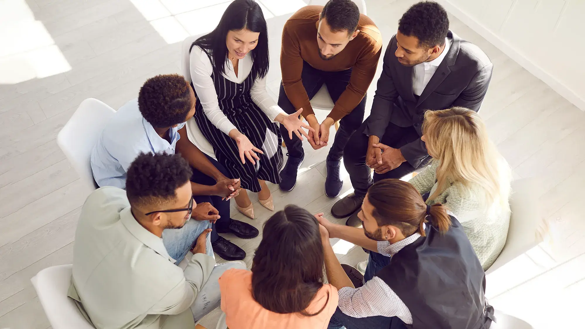 Team collaborating in communication team building activities