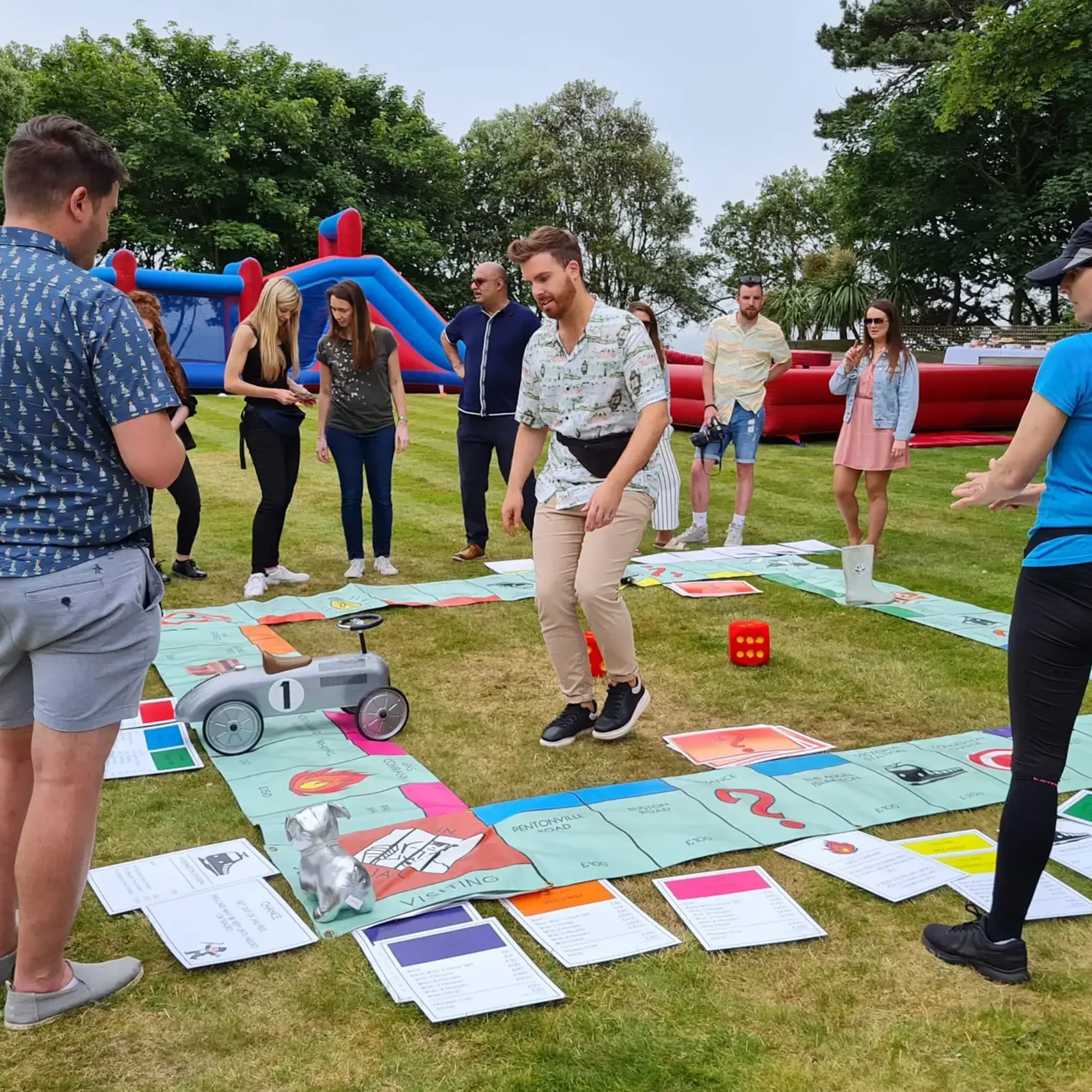 Teamopoly indoor team building activity giant monopoly on grass