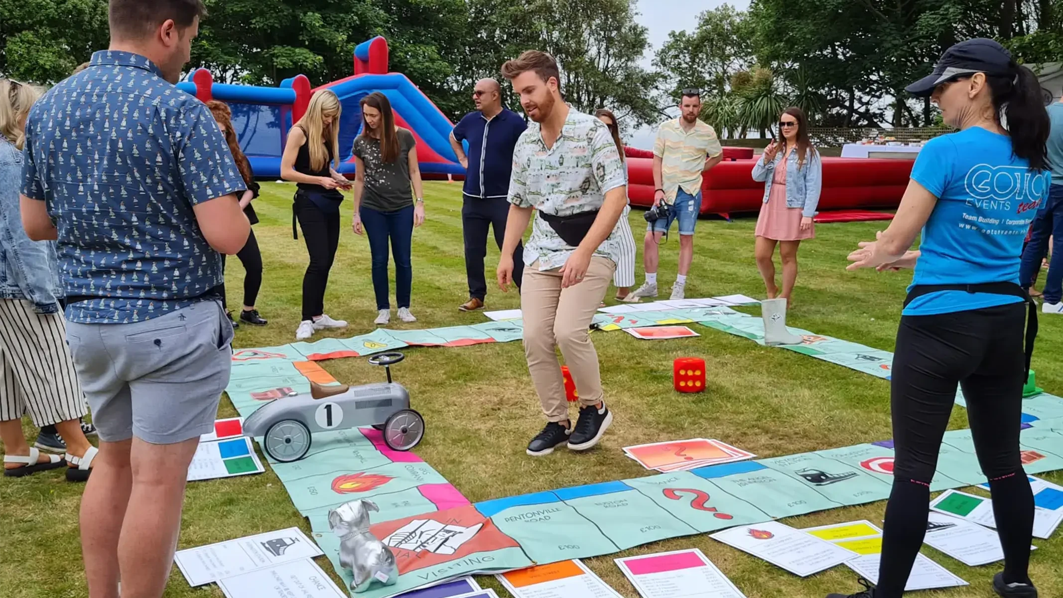 Teamopoly indoor team building activity giant monopoly on grass