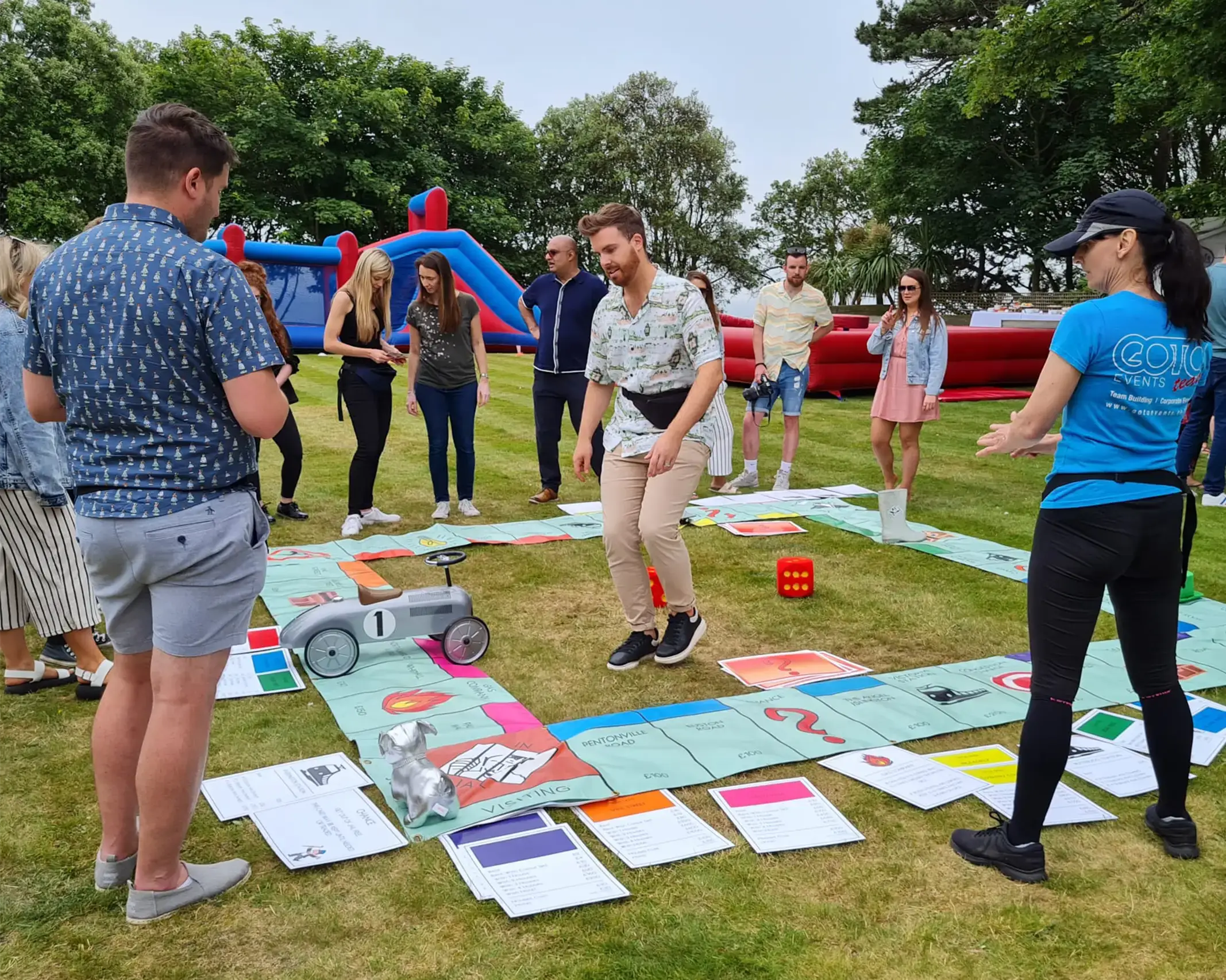 Teamopoly indoor team building activity giant monopoly on grass