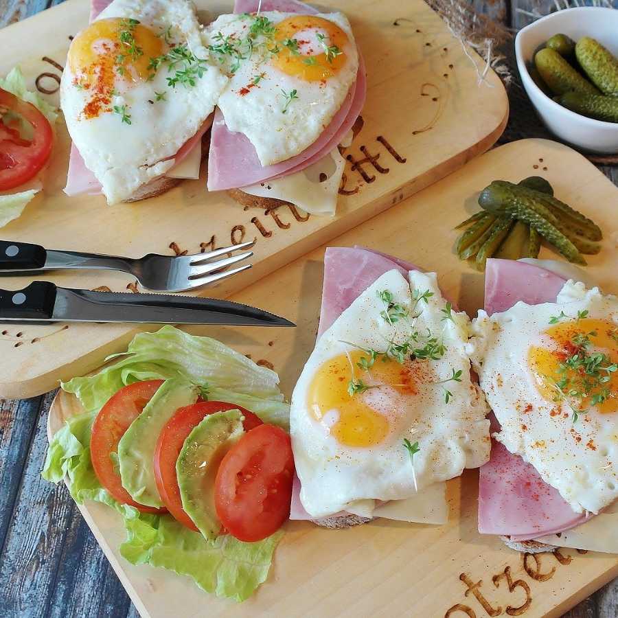 Close up of ham and eggs on pitta bread