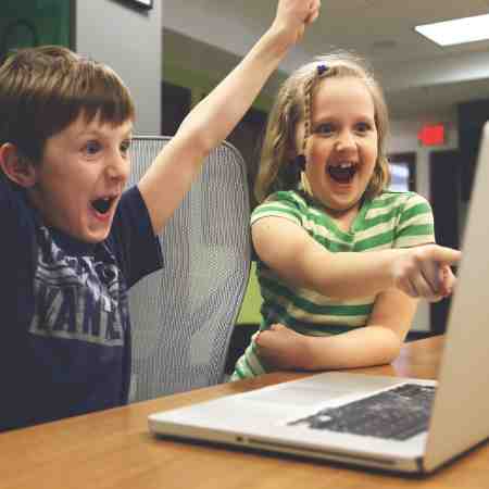 Virtual Team Building Children Cheering by Laptop