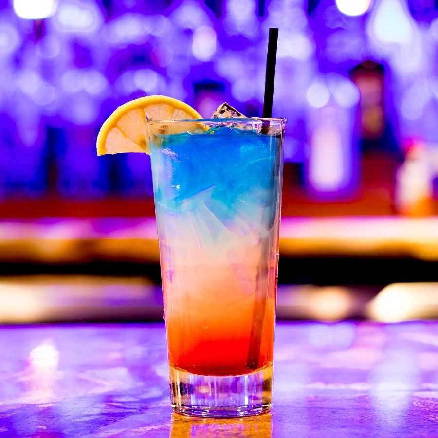 Brightly Coloured Cocktail on blurry background