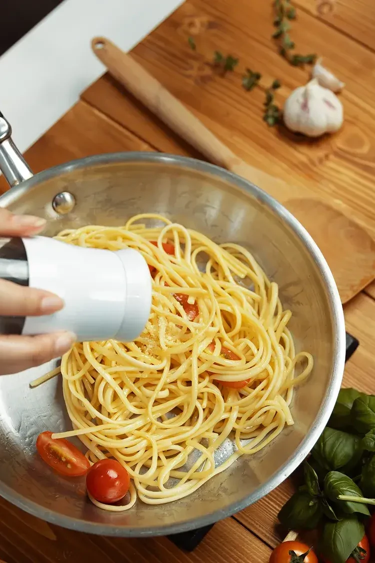 Participant competing in cooking team building event