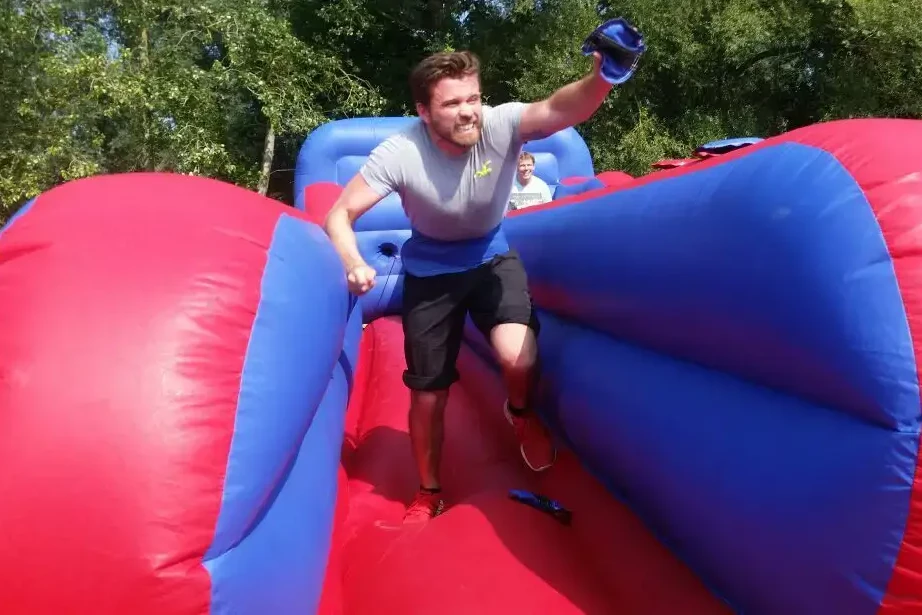 its a knockout team building inflatable course