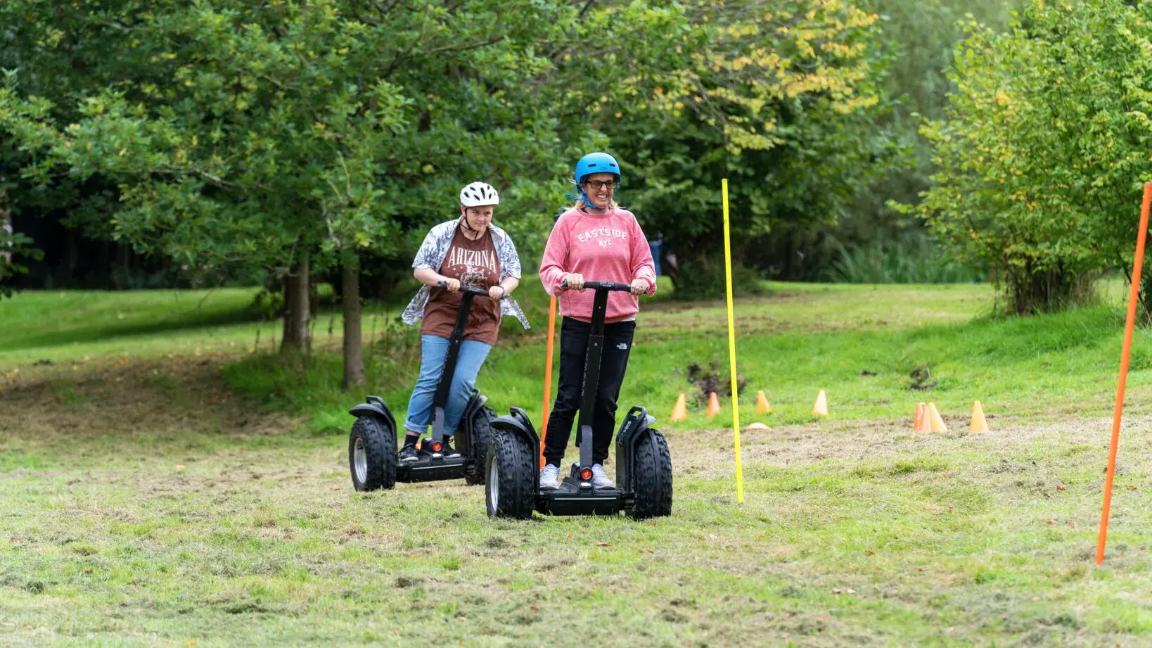 people on segway in outdoor team building event