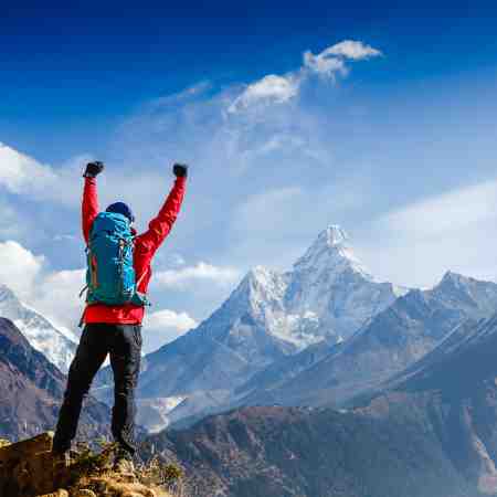 Virtual Team Building Peak Performance Man on Mountain