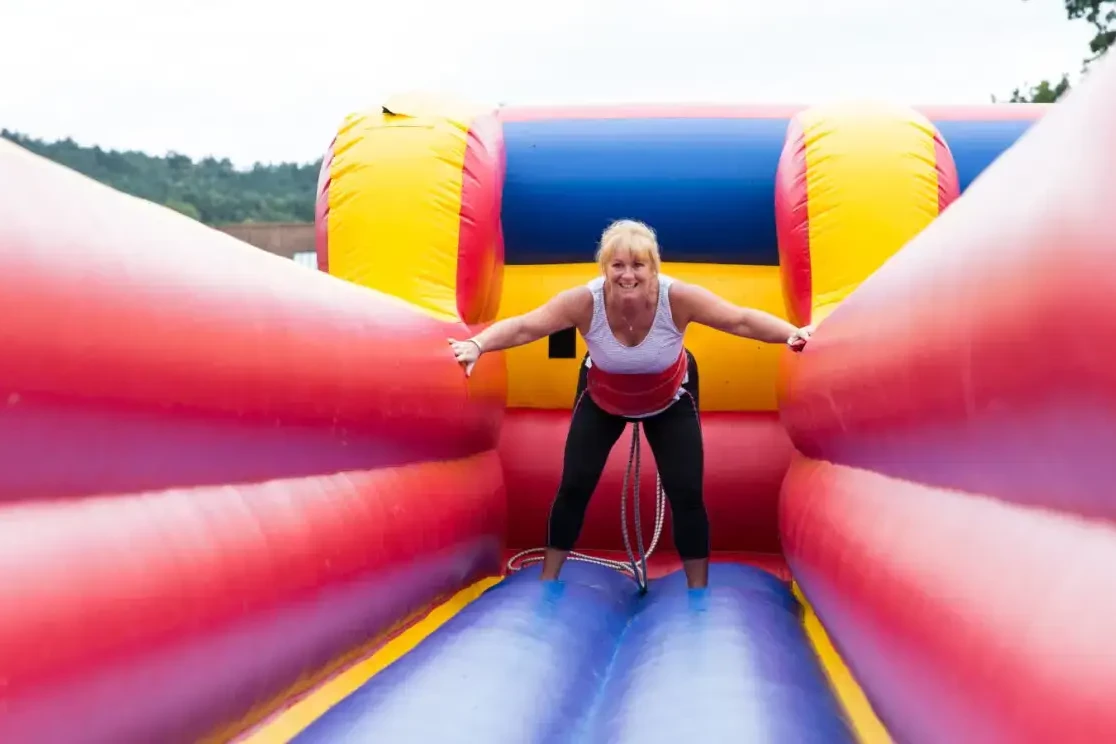 outdoor team building event on inflatable